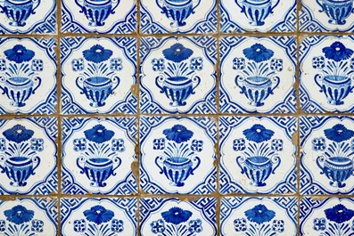 A field of 30 Dutch Delft blue and white flowervase tiles, 17th C.